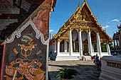 Bangkok Grand Palace, Ramakien murals of the gallery of the Wat Phra Kaew, on the background the supplementary library 